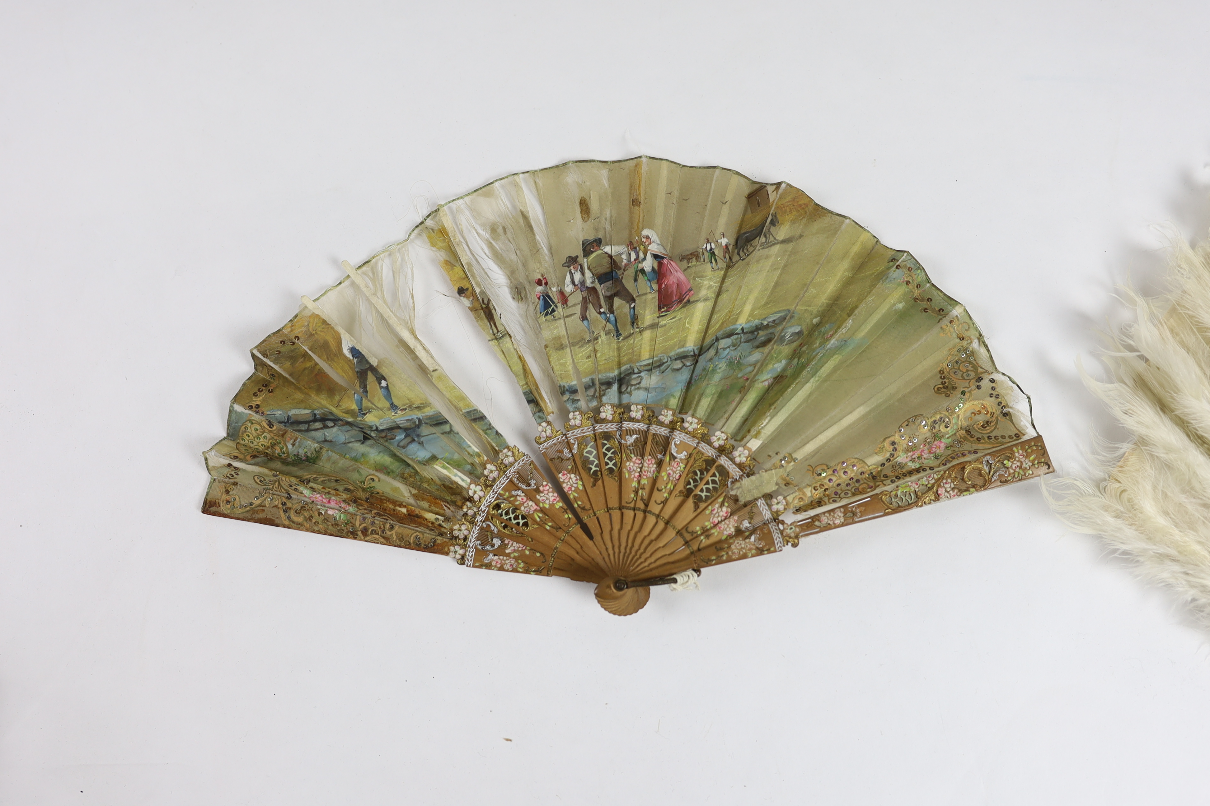 A collection of 19th and 20th century mostly paper fans, ten in reasonable condition useful for stage and film (16)